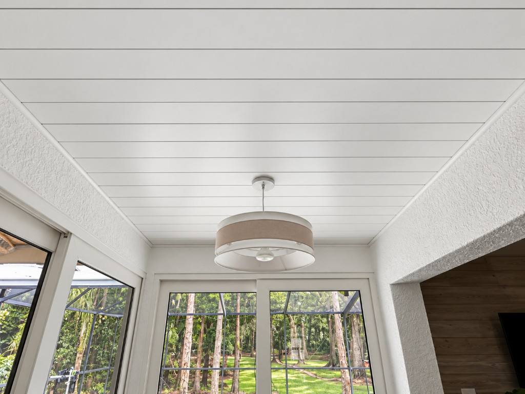 Custom white shiplap ceiling installation